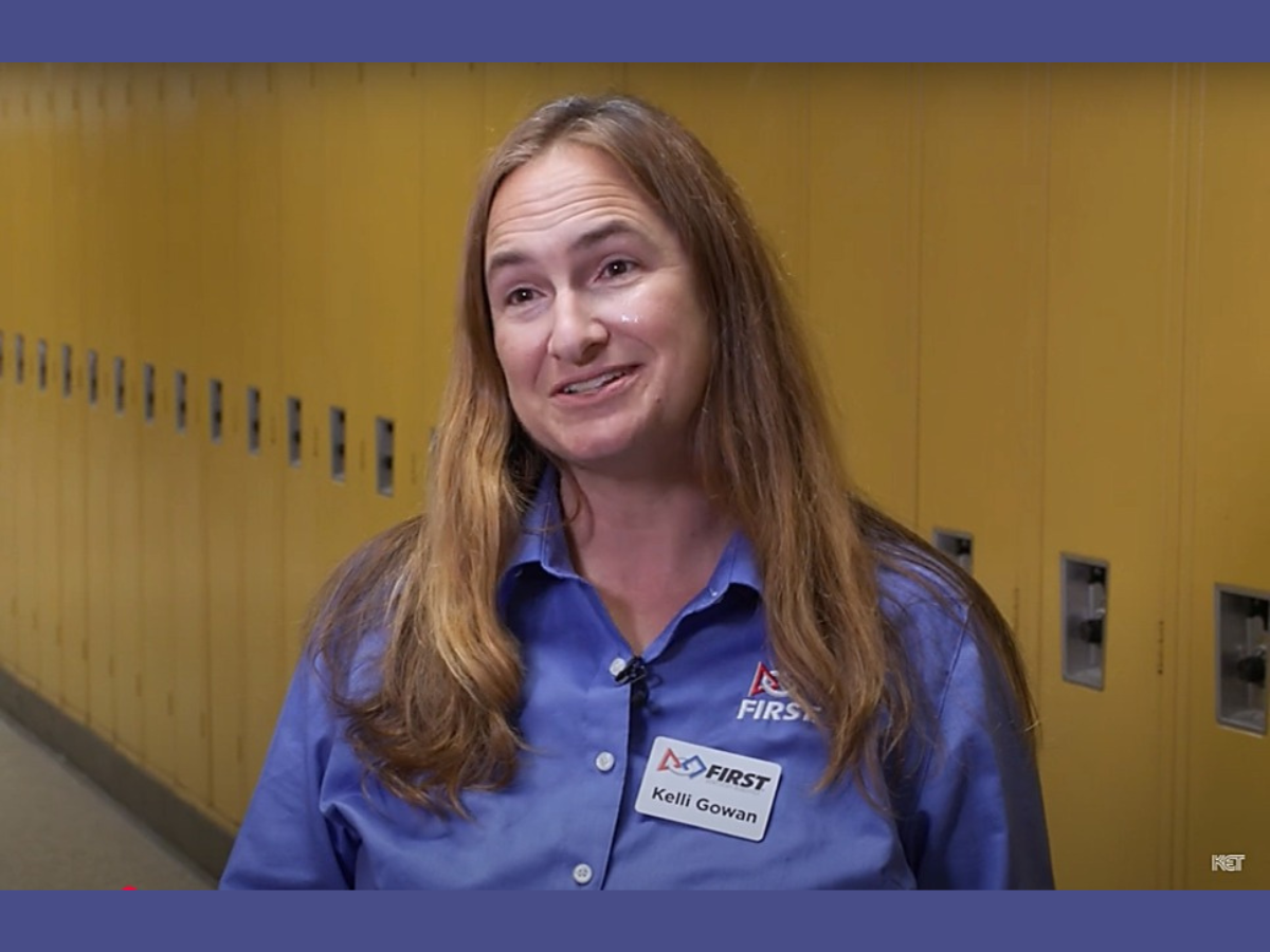 Kelli Gowan stillshot being interviewed on tv